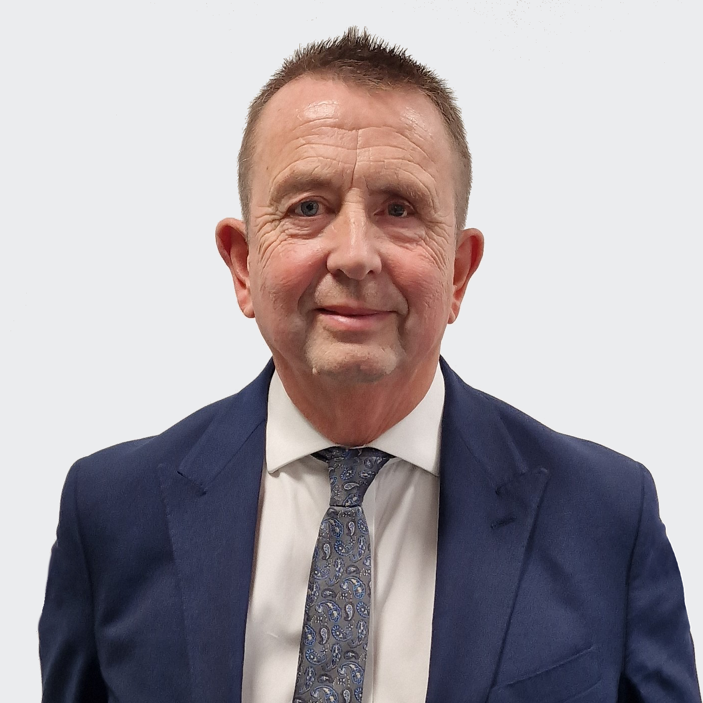 Man standing in front of a white background