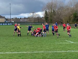 Group of people playing rugby