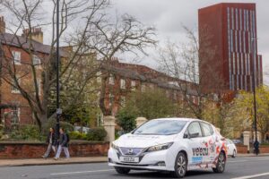 Veezu car driving on a street